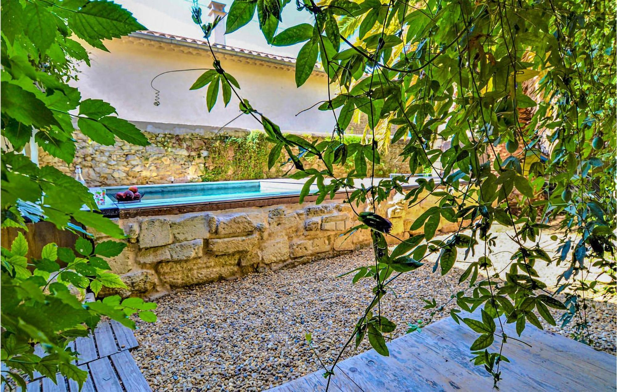 Awesome Apartment In Pujaut With Swimming Pool Bagian luar foto